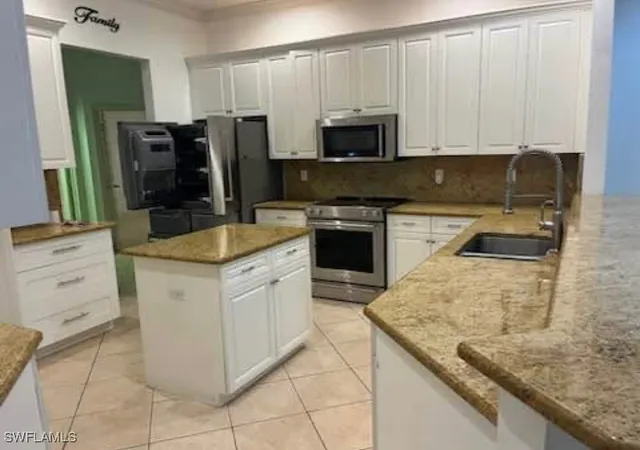 Photo 4 of Single family home for sale at 2841 12th Avenue NE, Naples, FL 34120 | MLS# 226004678 | Listing updated on 2026-01-29