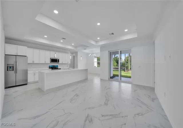 Photo 3 of Single family home for sale at 312 Harrison Dr, Lehigh Acres, FL 33936 | MLS# 2026005131 | Listing updated on 2026-06-01