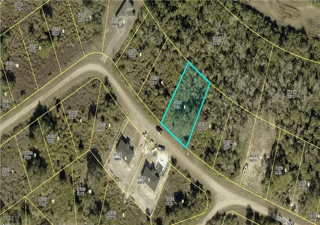 Photo 1 of Land for sale at 704 Ledge St, Lehigh Acres, FL 33972 | MLS# 2026006157 | Listing updated on 2026-02-18