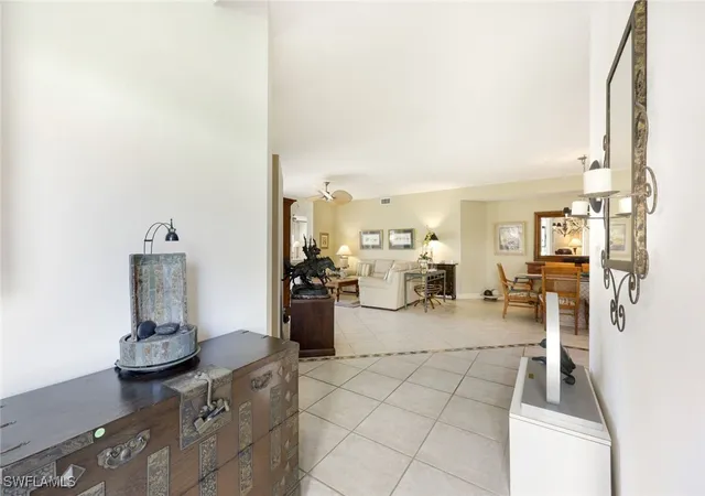 Listing Photo 5 - Condo for sale in building located at 610 Laguna Royale Blvd, Naples, FL 34119 - Unit #1001
