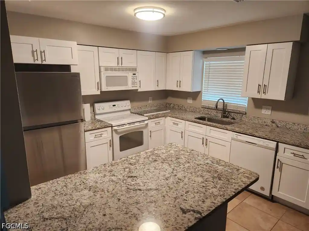 Photo 3 of Single family home for sale at 1402 NE 18th Street, Cape Coral, FL 33909 | MLS# 2026006817 | Listing updated on 2026-10-28