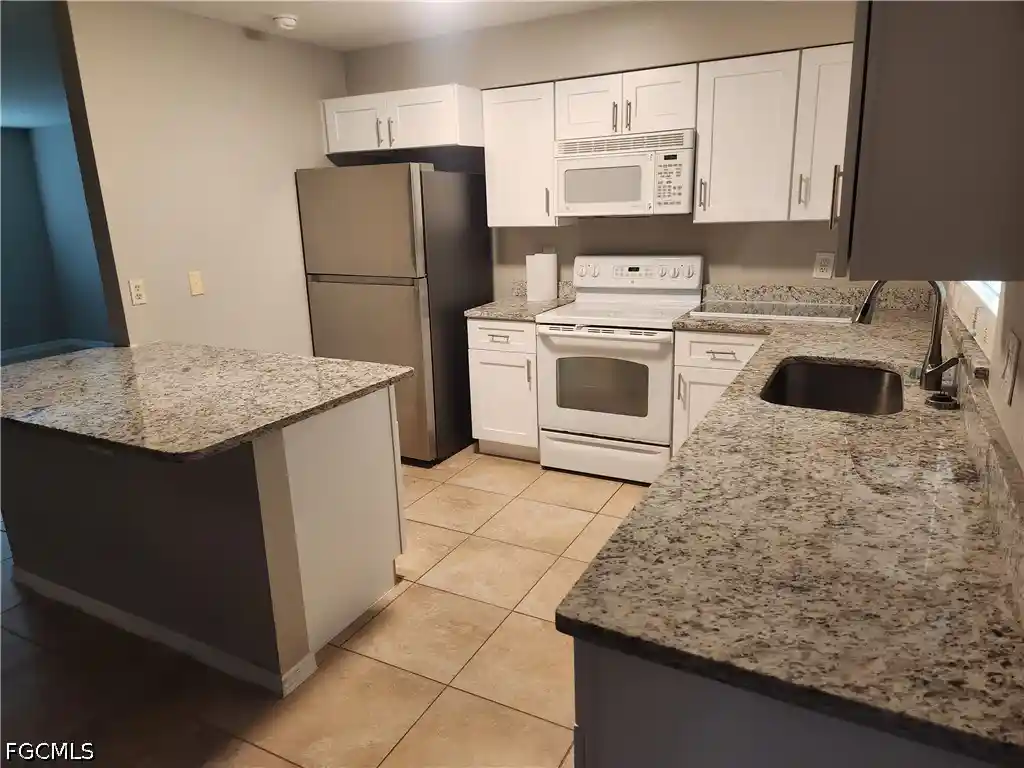 Photo 4 of Single family home for sale at 1402 NE 18th Street, Cape Coral, FL 33909 | MLS# 2026006817 | Listing updated on 2026-10-28
