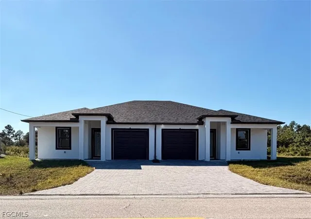 Photo 1 of Multi family home for sale at 213 215 W 12th Street, Lehigh Acres, FL 33972 | MLS# 2026007084 | Listing updated on 2026-02-09