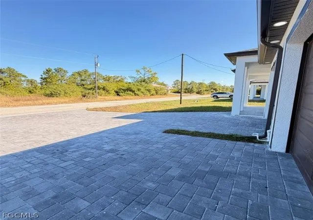 Photo 3 of Multi family home for sale at 213 215 W 12th Street, Lehigh Acres, FL 33972 | MLS# 2026007084 | Listing updated on 2026-02-09