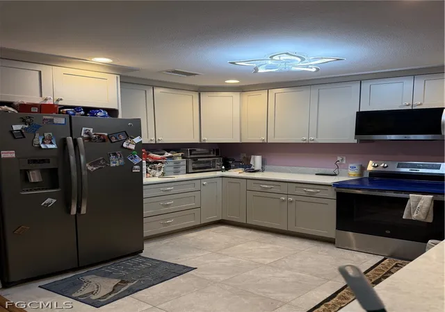 Photo 3 of Single family home for sale at 557 Ridgewood St NW, Port Charlotte, FL 33952 | MLS# 2026007091 | Listing updated on 2026-03-03