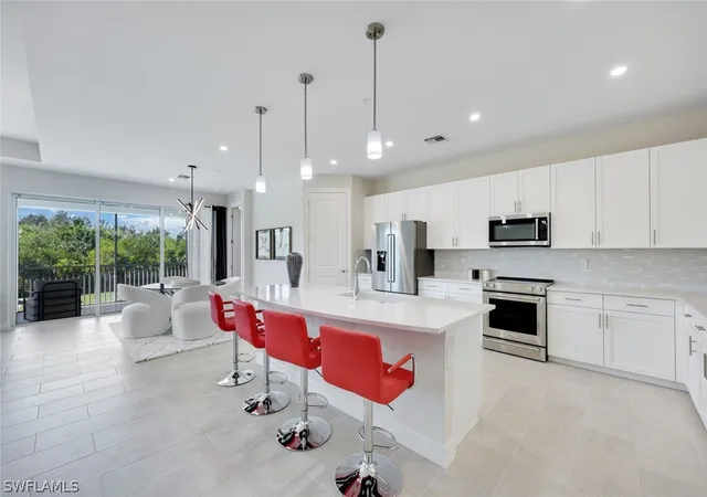 2nd image of 303 Indies Dr W #201, Naples, FL 34114 | MLS# 226006856