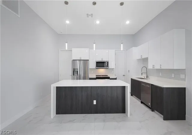 Photo 3 of Single family home for sale at 901 Nw 19th Terrace, Cape Coral, FL 33993 | MLS# 2026007732 | Listing updated on 2026-09-01