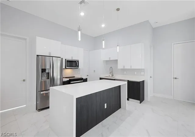 Photo 3 of Single family home for sale at 901 NW 19th Terrace, Cape Coral, FL 33993 | MLS# 2026007732 | Listing updated on 2026-09-01