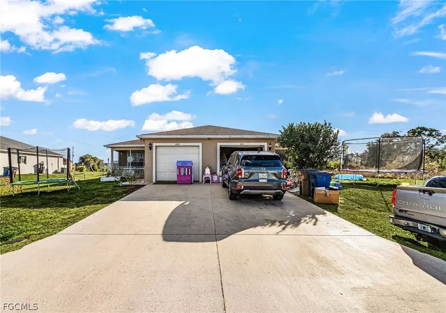 1st image of 4411 22Nd St Sw, Lehigh Acres, FL 33973 | MLS# 2026008219