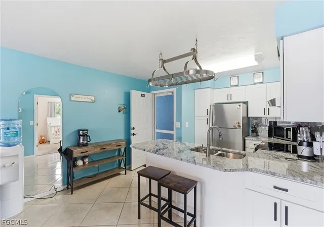 Photo 1 of Condominium at 1100 Pondella Rd #610, Cape Coral, FL 33909 | MLS# 2026008325 | | Sold on 2026-04-30