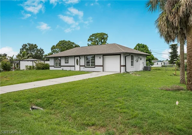 Photo 1 of Single family home for sale at 803 Monroe Dr, Lehigh Acres, FL 33936 | MLS# 226008061 | Listing updated on 2026-06-18
