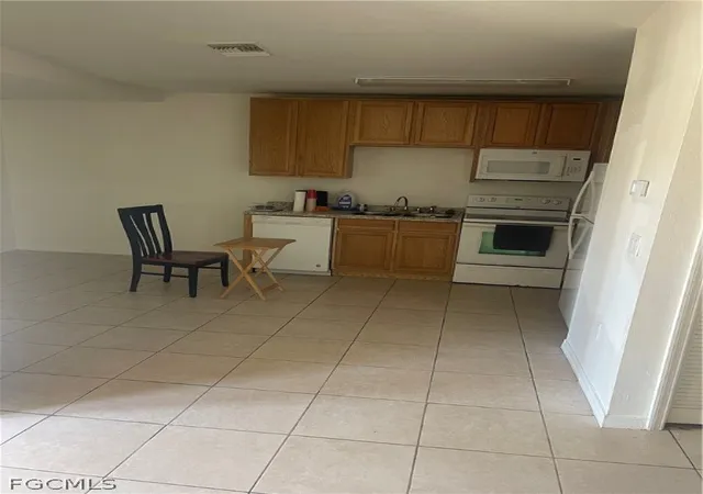 5th image of 4721/4723 26Th St Sw, Lehigh Acres, FL 33973 | MLS# 2026009287