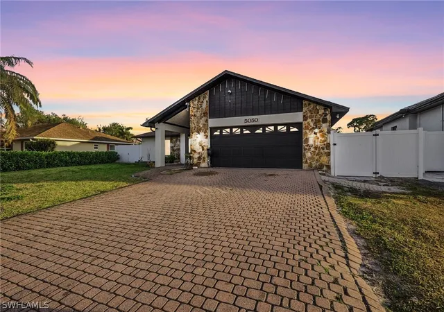 1st image of 5050 32nd Ave Sw, Naples, FL 34116 | MLS# 226008370