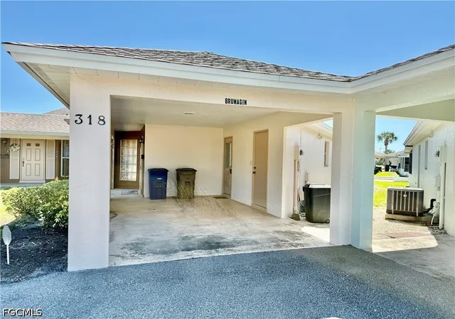 Photo 3 of Single family home for sale at 318 Joel Blvd, Lehigh Acres, FL 33936 | MLS# 2026009691 | Listing updated on 2026-07-22