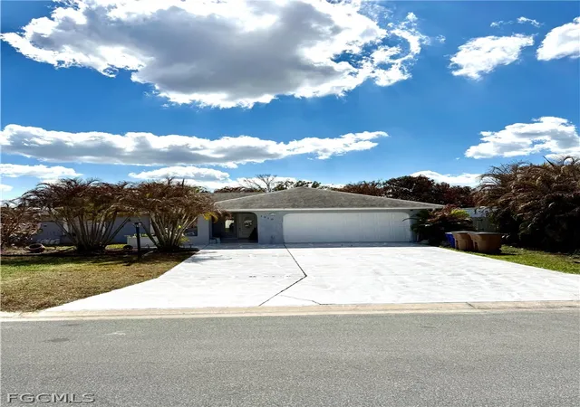 1st image of 1410 Caywood Cir S, Lehigh Acres, FL 33936 | MLS# 2025025057