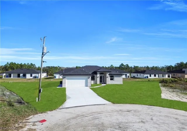Photo 2 of Single family home for sale at 1930 Zombar Ct, Lehigh Acres, FL 33972 | MLS# 2026010088 | Listing updated on 2026-02-26