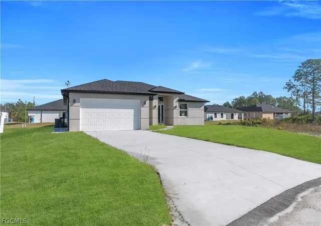 Photo 3 of Single family home for sale at 1930 Zombar Ct, Lehigh Acres, FL 33972 | MLS# 2026010088 | Listing updated on 2026-02-26