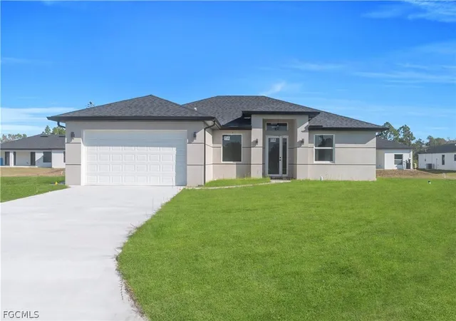 Photo 3 of Single family home for sale at 1930 Zombar Ct, Lehigh Acres, FL 33972 | MLS# 2026010088 | Listing updated on 2026-02-26