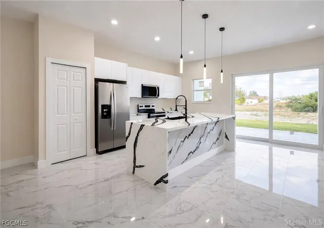 5th image of 1141 /1143 Hightower Ave S, Lehigh Acres, FL 33973 | MLS# 2026010168