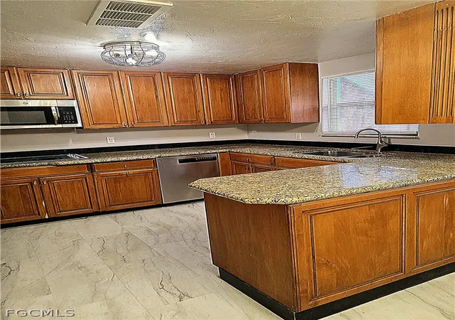 Photo 2 of Single family home for sale at 135 Powell Crk Cir, North Fort Myers, FL 33917 | MLS# 2026010384 | Listing updated on 2026-06-27