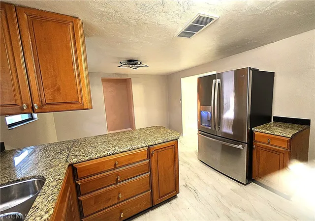 Photo 2 of Single family home for sale at 135 Powell Crk Cir, North Fort Myers, FL 33917 | MLS# 2026010384 | Listing updated on 2026-06-27
