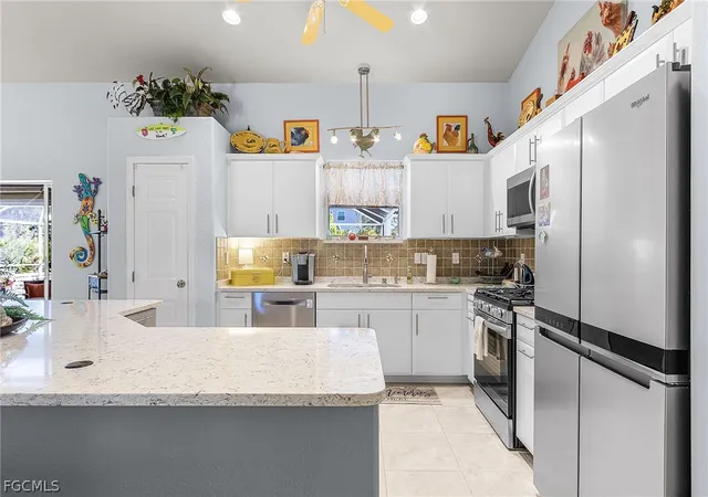 4th image of 11890 Oscoda Ct, Bokeelia, FL 33922 | MLS# 2026010543