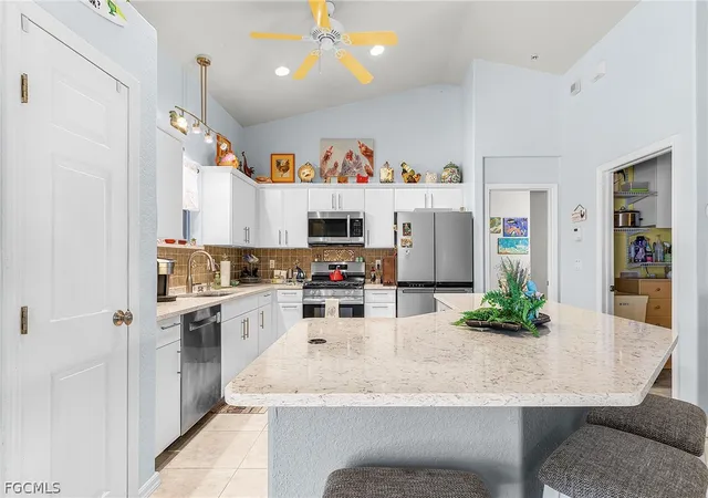 5th image of 11890 Oscoda Ct, Bokeelia, FL 33922 | MLS# 2026010543