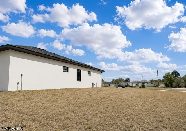 32nd image of 811 Dartmouth Ct, Lehigh Acres, FL 33974 | MLS# 226009910