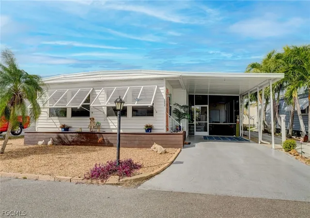Photo 3 of Manufactured home for sale at 5554 Sir Walter Way, North Fort Myers, FL 33917 | MLS# 2026011132 | Listing updated on 2026-10-07