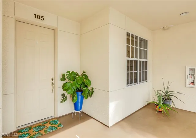 Listing Photo 4 - Condo for sale in building located at 4843 Hampshire Ct, Naples, FL 34112 - Unit #105