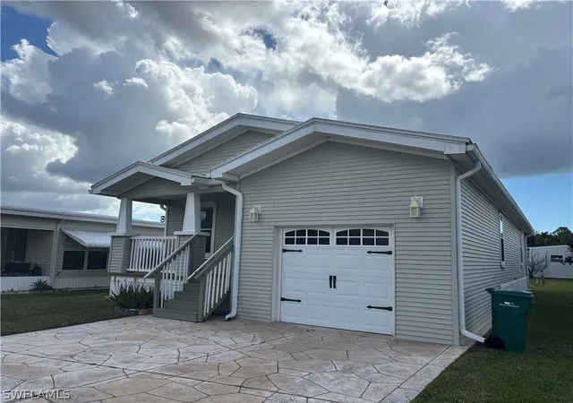 Photo 2 of Manufactured home for sale at 12 Aquamarine Ave #12Q, Naples, FL 34114 | MLS# 226010432 | Listing updated on 2026-07-31