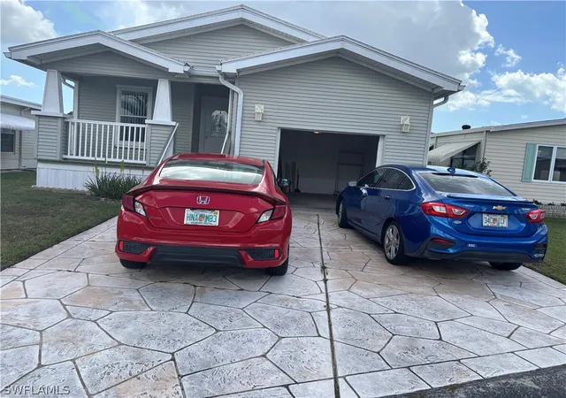 Photo 3 of Manufactured home for sale at 12 Aquamarine Ave #12Q, Naples, FL 34114 | MLS# 226010432 | Listing updated on 2026-07-31
