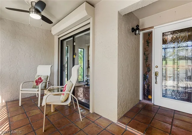 Listing Photo 4 - Condo for sale in building located at 15470 Cedarwood Ln, Naples, FL 34110 - Unit #201