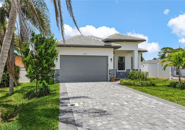 Photo 2 of Single family home for sale at 859 108th Avenue N, Naples, FL 34108 | MLS# 226011400 | Listing updated on 2026-03-14