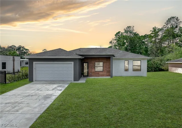 1st image of 133 Greenbriar Blvd, Lehigh Acres, FL 33972 | MLS# 2026012692