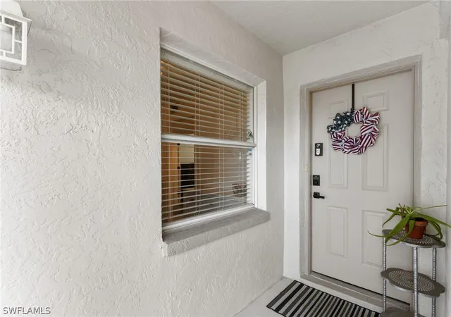 Listing Photo 5 - Condo for sale in building located at 1336 Churchill Cir, Naples, FL 34116 - Unit #K104