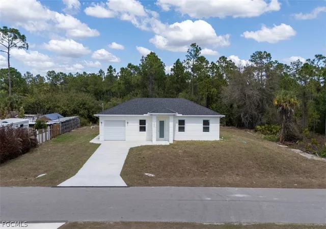 Photo 1 of Sale Pending at 105 E 9th Street, Lehigh Acres, FL 33972 | MLS# 2026012878 | Listing updated on 2026-07-13
