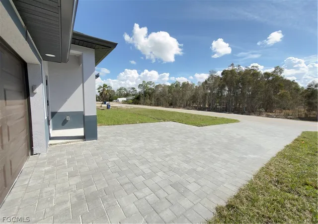 4th image of 945 Homestead Rd S, Lehigh Acres, FL 33974 | MLS# 2026012954