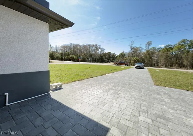 5th image of 945 Homestead Rd S, Lehigh Acres, FL 33974 | MLS# 2026012954