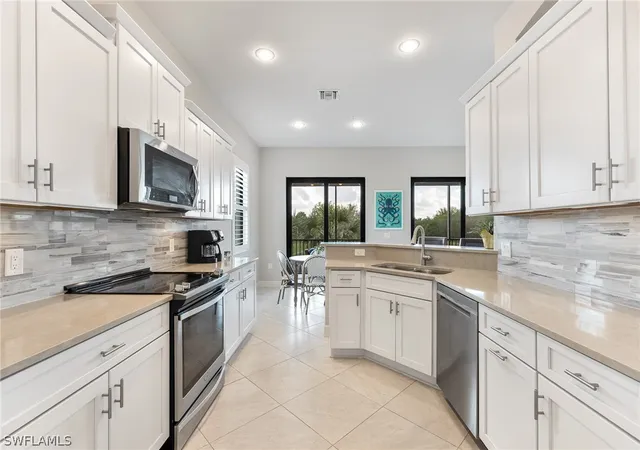 Listing Photo 5 - Condo for sale in building located at 12058 Covent Gdn Ct, Naples, FL 34120 - Unit #1203