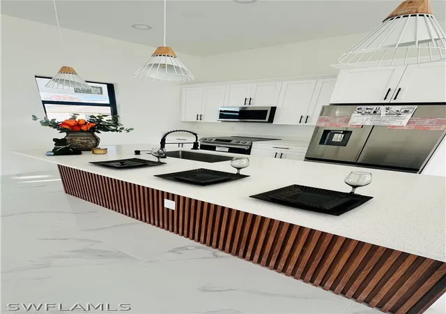 3rd image of 2614 12th Street SW, Lehigh Acres, FL 33976 | MLS# 226012174