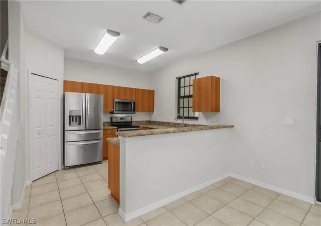 Photo 4 of Townhouse for sale at 15186 Summit Pl Cir, Naples, FL 34119 | MLS# 226011531 | Listing updated on 2026-07-08