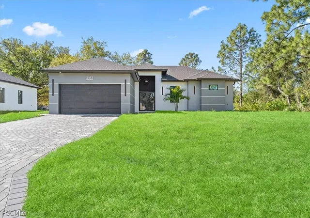 Photo 1 of Single family home for sale at 3013 14th Street W, Lehigh Acres, FL 33971 | MLS# 2026013780 | Listing updated on 2026-07-22