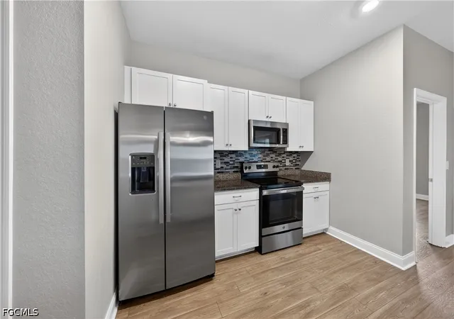 Photo 3 of Sale Pending at 1001 NE 35th Lane, Cape Coral, FL 33909 | MLS# 2026013876 | Listing updated on 2026-06-24