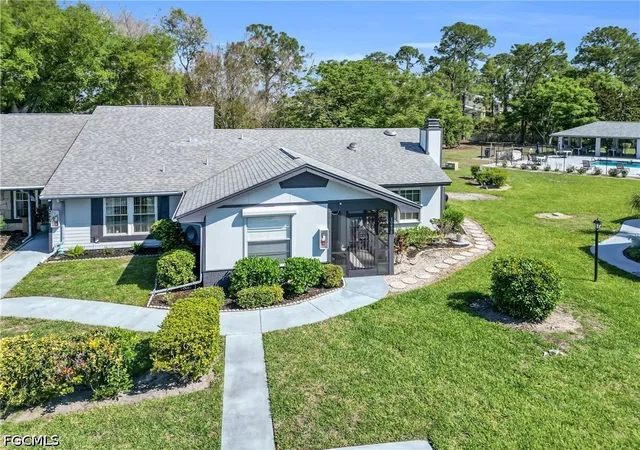 Photo 1 of Townhouse for sale at 10438 Lakeport Ct, Lehigh Acres, FL 33936 | MLS# 2026014070 | Listing updated on 2026-08-12