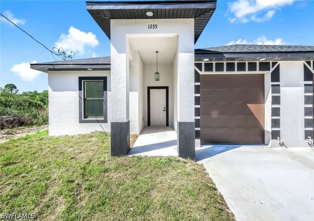 Photo 2 of Multi family home for sale at 1235/1237 Hillcrest St E, Lehigh Acres, FL 33974 | MLS# 226012720 | Listing updated on 2026-06-30