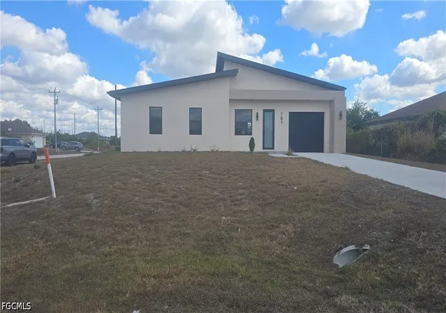 1st image of 761 Bell Blvd S, Lehigh Acres, FL 33974 | MLS# 2026014336