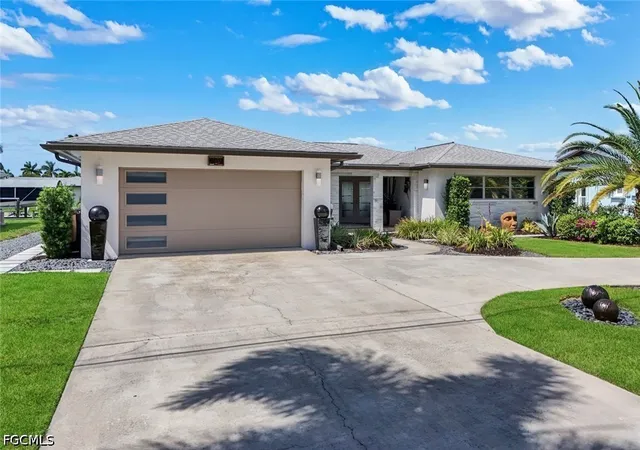 1st image of 409 Tower Dr, Cape Coral, FL 33904 | MLS# 2026014981