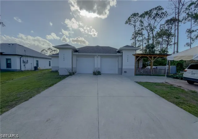 1st image of 1123 1125 Abrams Blvd, Lehigh Acres, FL 33971 | MLS# 226013560