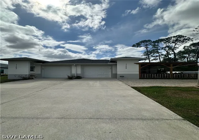Photo 3 of Multi family home for sale at 1123 1125 Abrams Blvd, Lehigh Acres, FL 33971 | MLS# 226013560 | Listing updated on 2026-07-07
